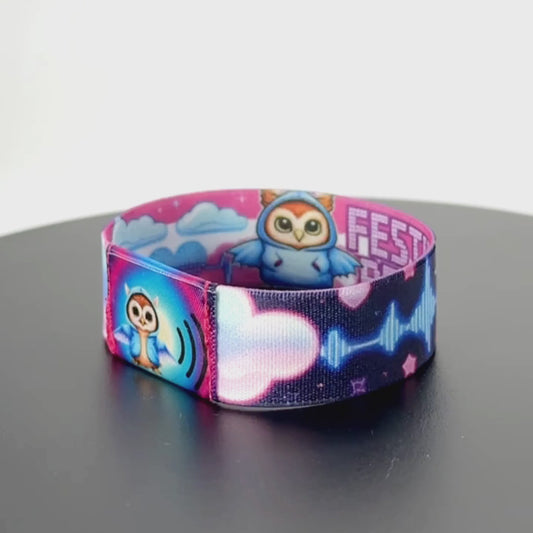 8-second rotating video of the wristband’s back, highlighting bold pixelated “B2B YOU” text over a dark blue field dotted with star and soundwave motifs.
